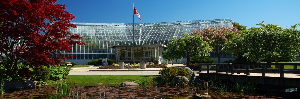 Centennial Park Conservatory and pond in Etobicoke — City of Toronto photograph