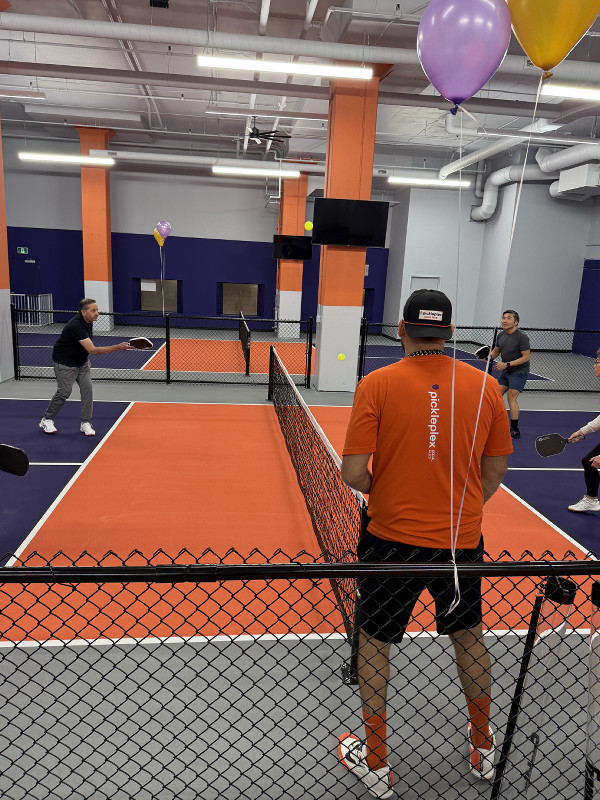 Finished indoor pickleball courts with players at Pickleplex York Mills