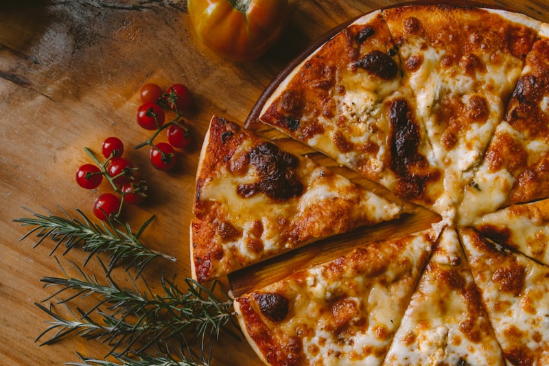Classic New York-style pizza slices with perfectly charred crust
