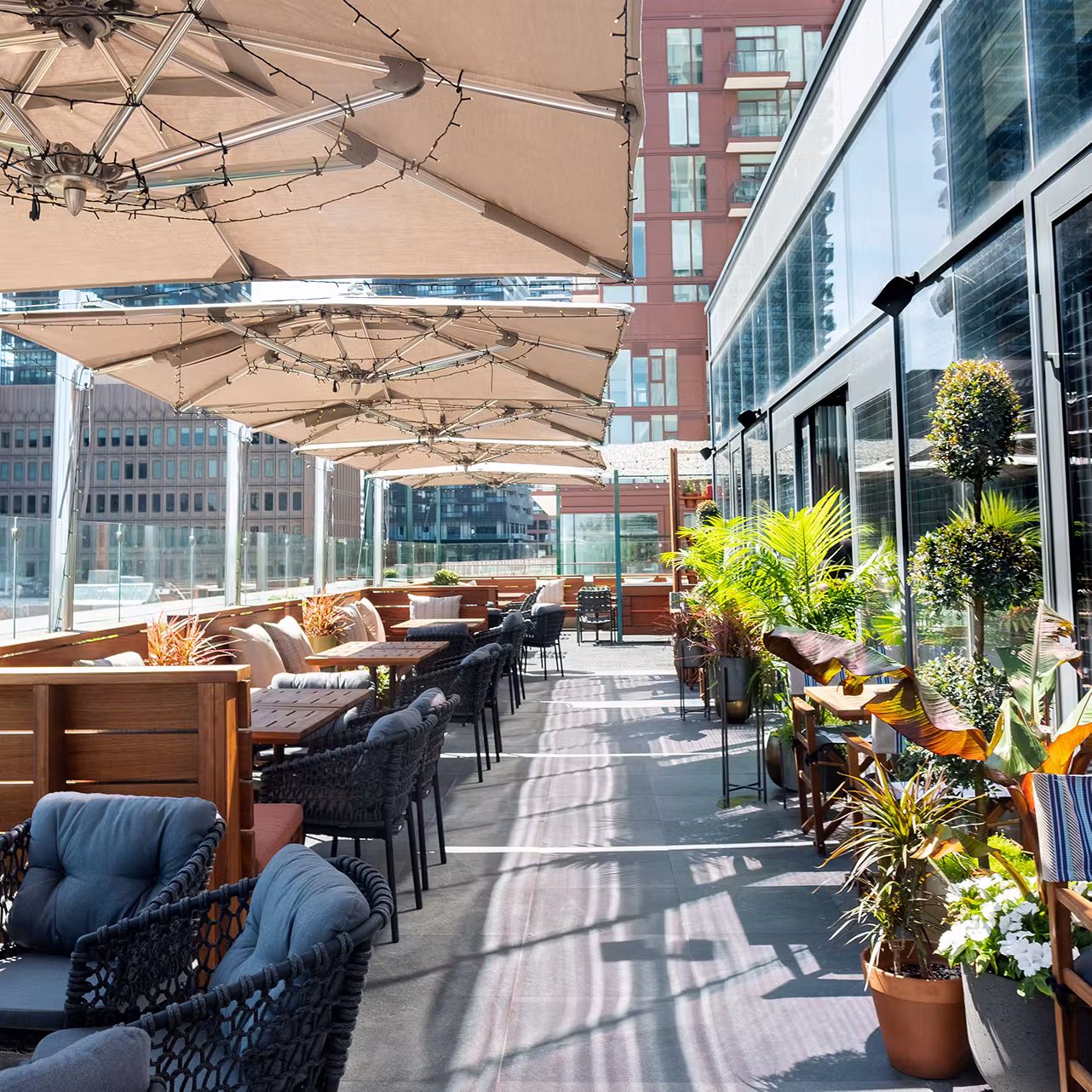 Stock Bar’s rooftop garden patio overlooking Midtown Toronto