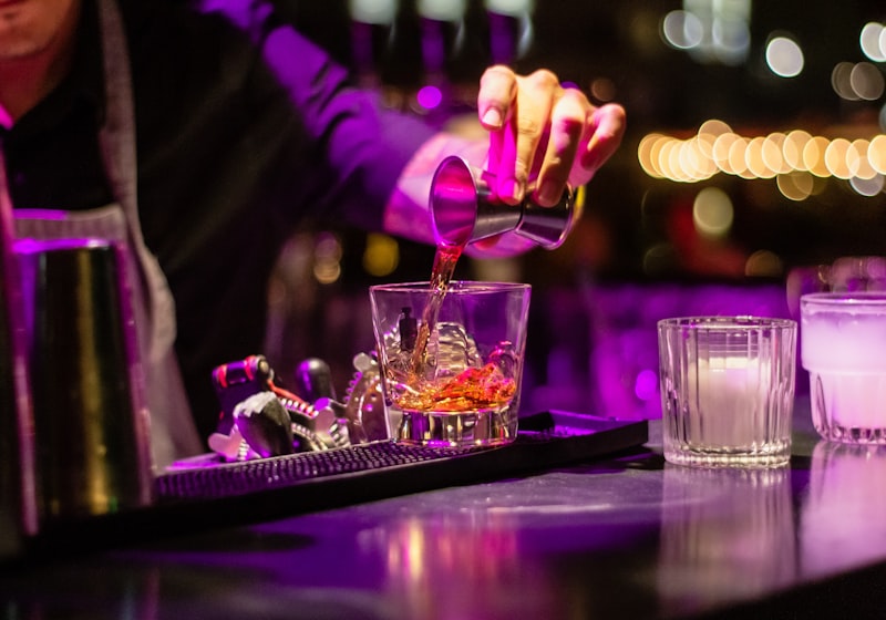 Vibrant nightclub interior with dramatic lighting and dance floor