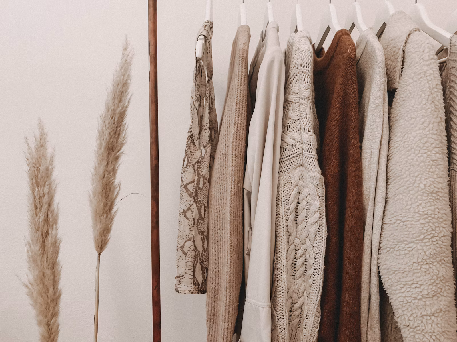 Vintage clothing-rack photography (Unsplash FLAG — Uncle Vintage Shopify storefront returned 402)