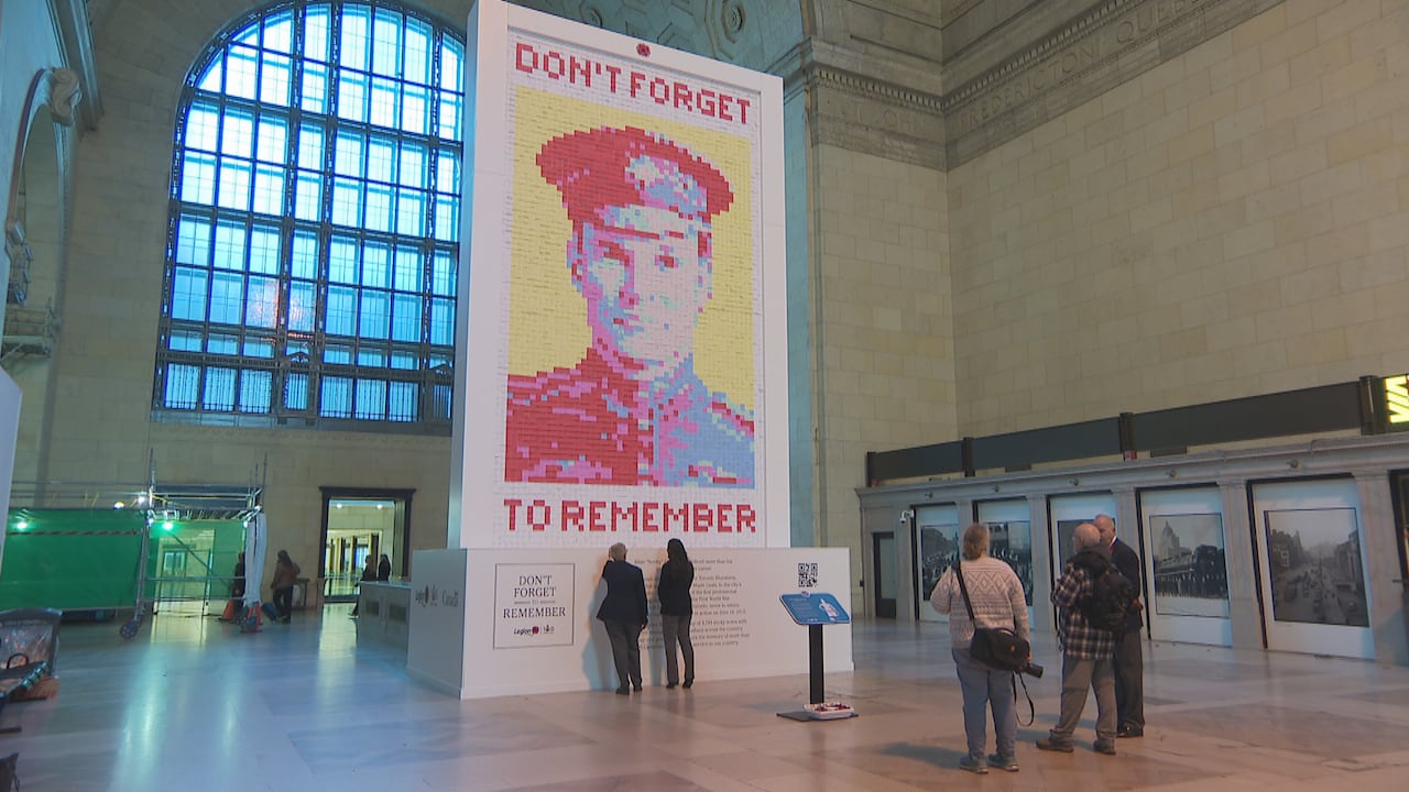 A 30-foot sticky-note tribute honours a fallen soldier at Union Station