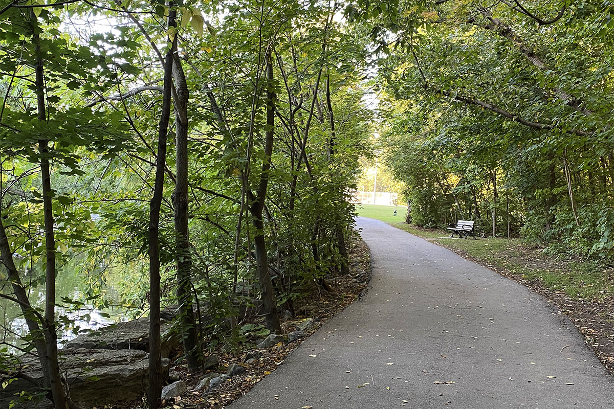 Trail running beside Etobicoke Creek in Etobicoke Valley Park