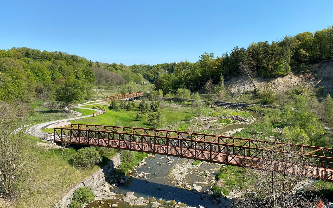 Pedestrian bridges crossing Upper Highland Creek in Morningside Park