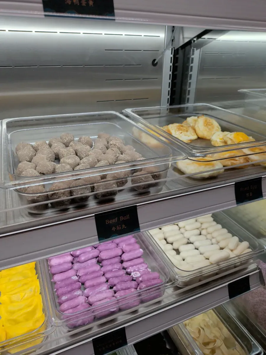 Close up of various meatballs and dumplings