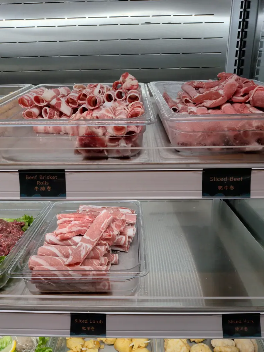 Close up of various thinly sliced meats