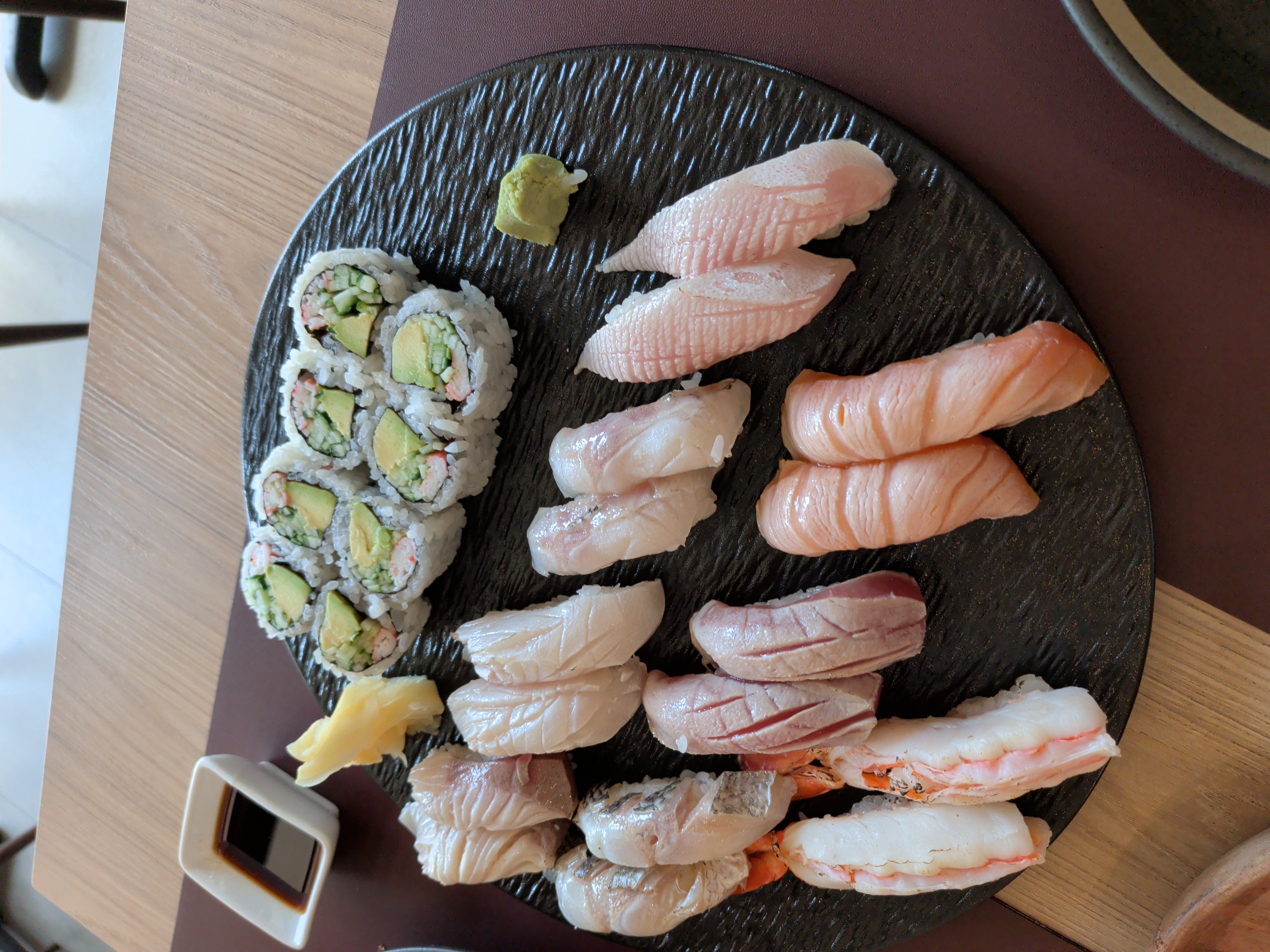 A platter of assorted nigiri and maki rolls