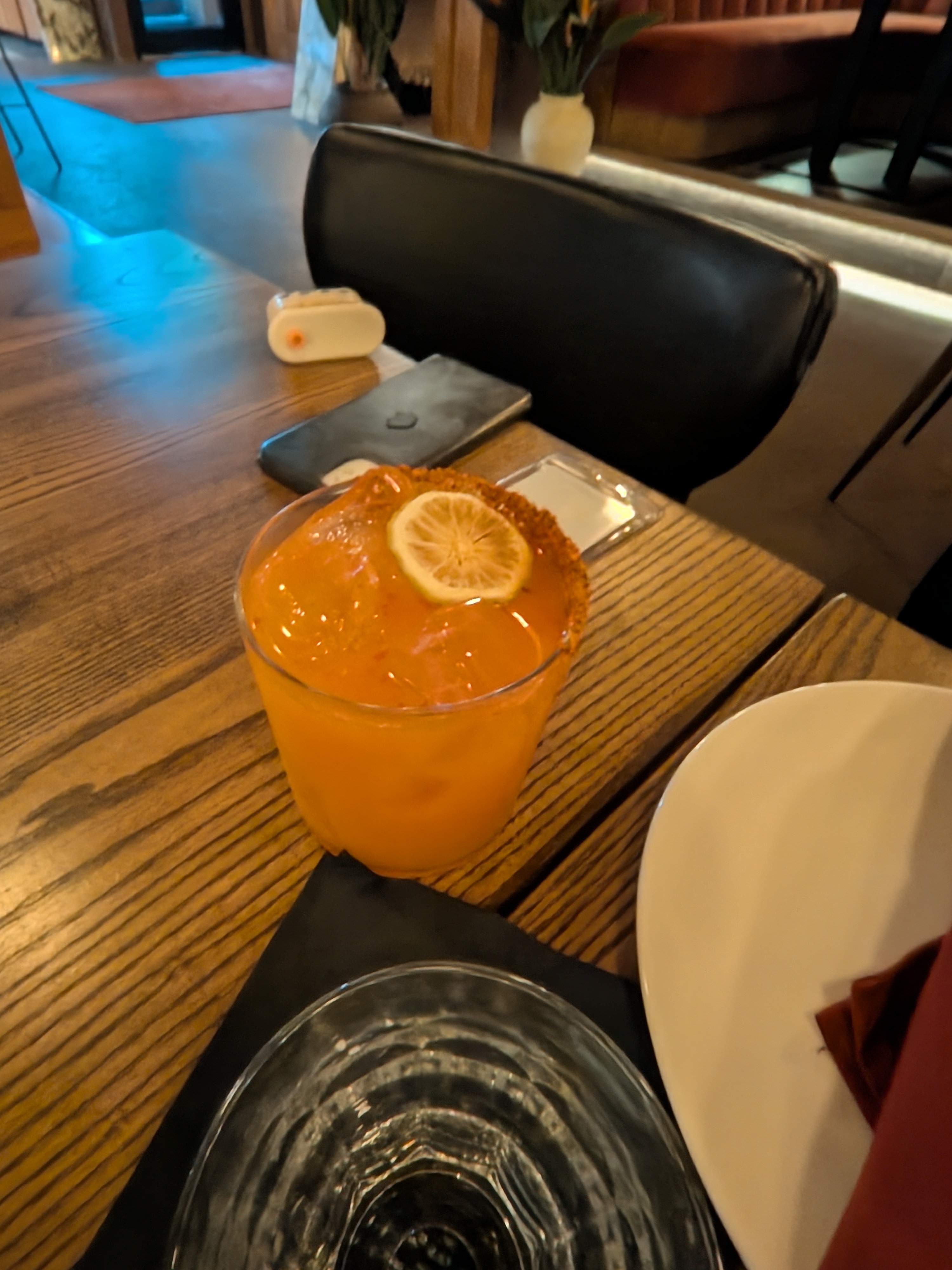 Orange chili-rim cocktail in a rocks glass at Sonny Can't Dance