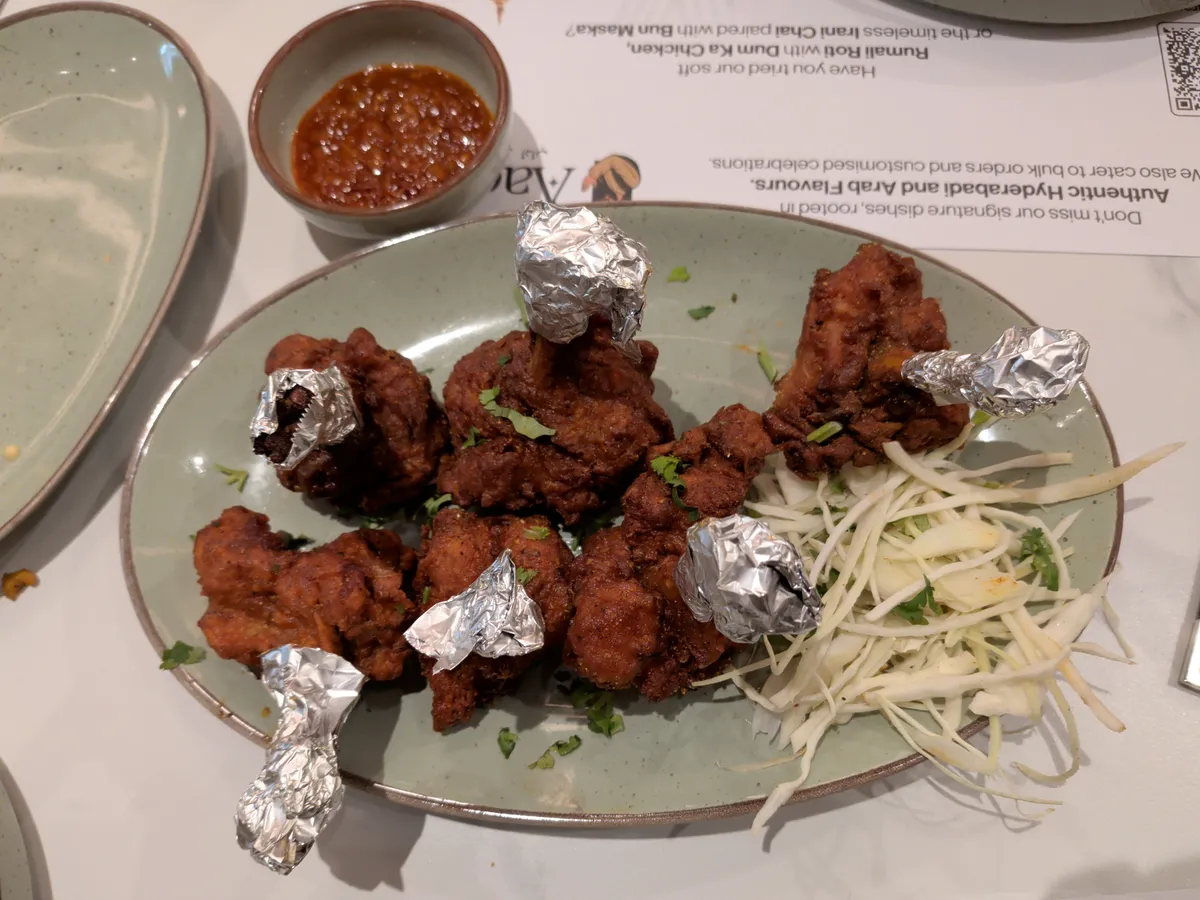 Chicken lollipops on a plate